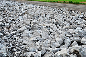 Recycling and reuse crushed concrete rubble, asphalt, building material, blocks. Broken concrete slabs at construction site. ÃÂ¡ photo